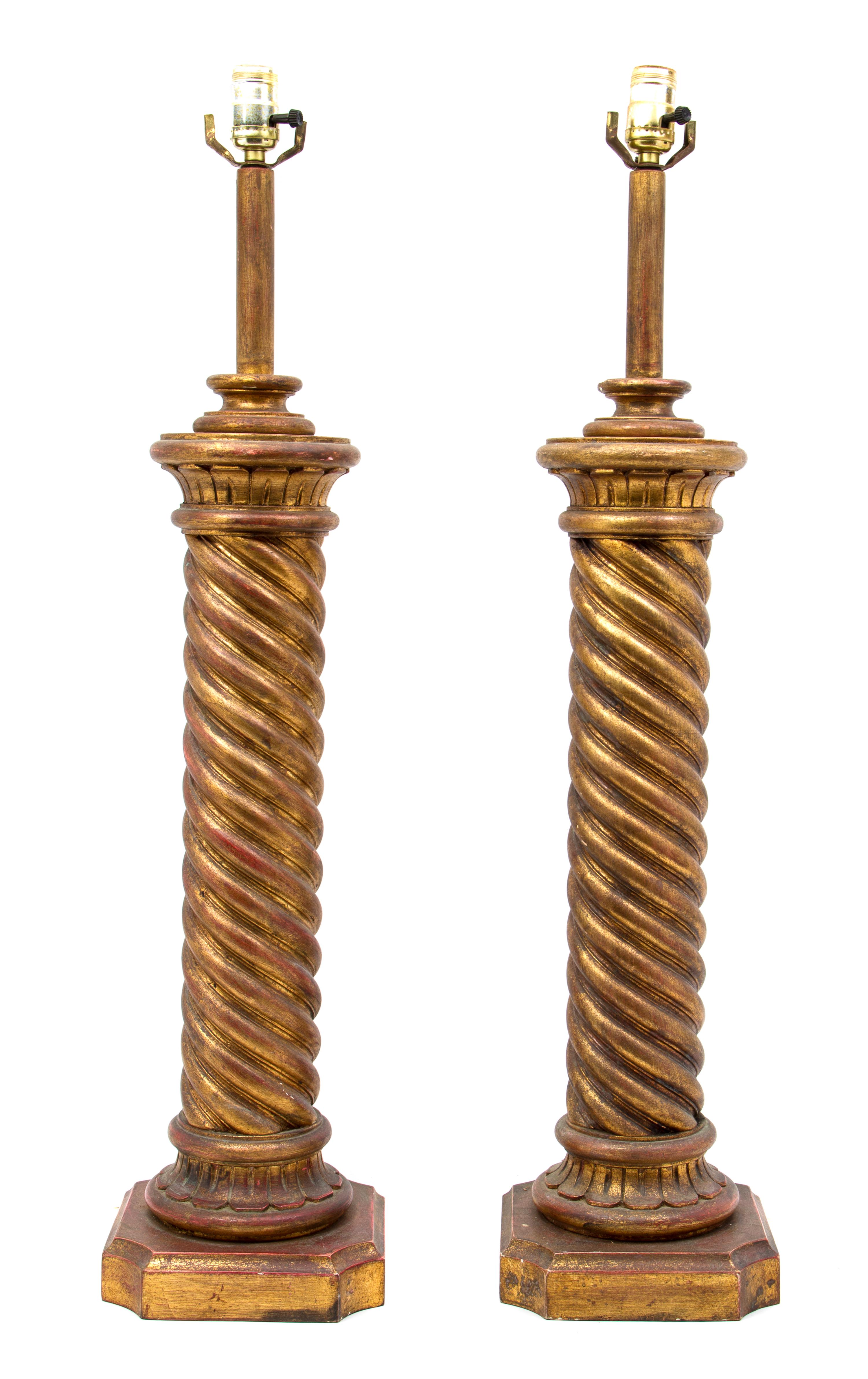 A Pair of Italian Turned Giltwood Lamps, Height overall 34 1/4 inches.