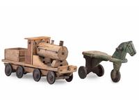 A Wooden Toy Train and Tricycle