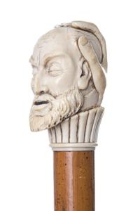 An English Ivory Handled Walking Stick, Length of handle 3 1/2 x length overall 36 7/8 inches.