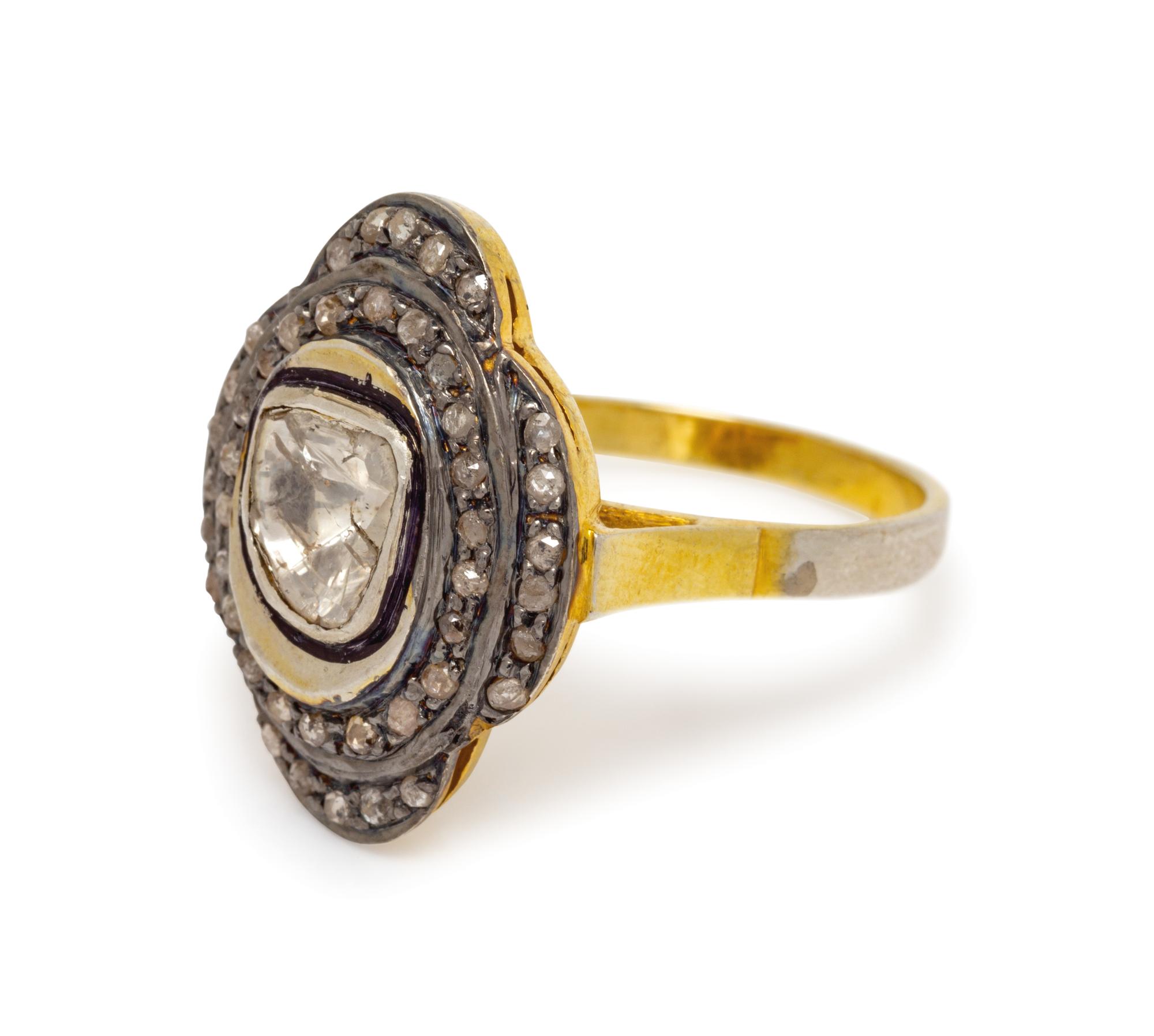 A Silver Topped Yellow Gold Plated and Diamond Ring,