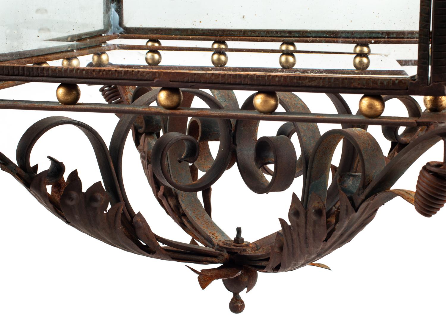 A Pair of Large Continental Wrought Iron and Etched Glass Lanterns
