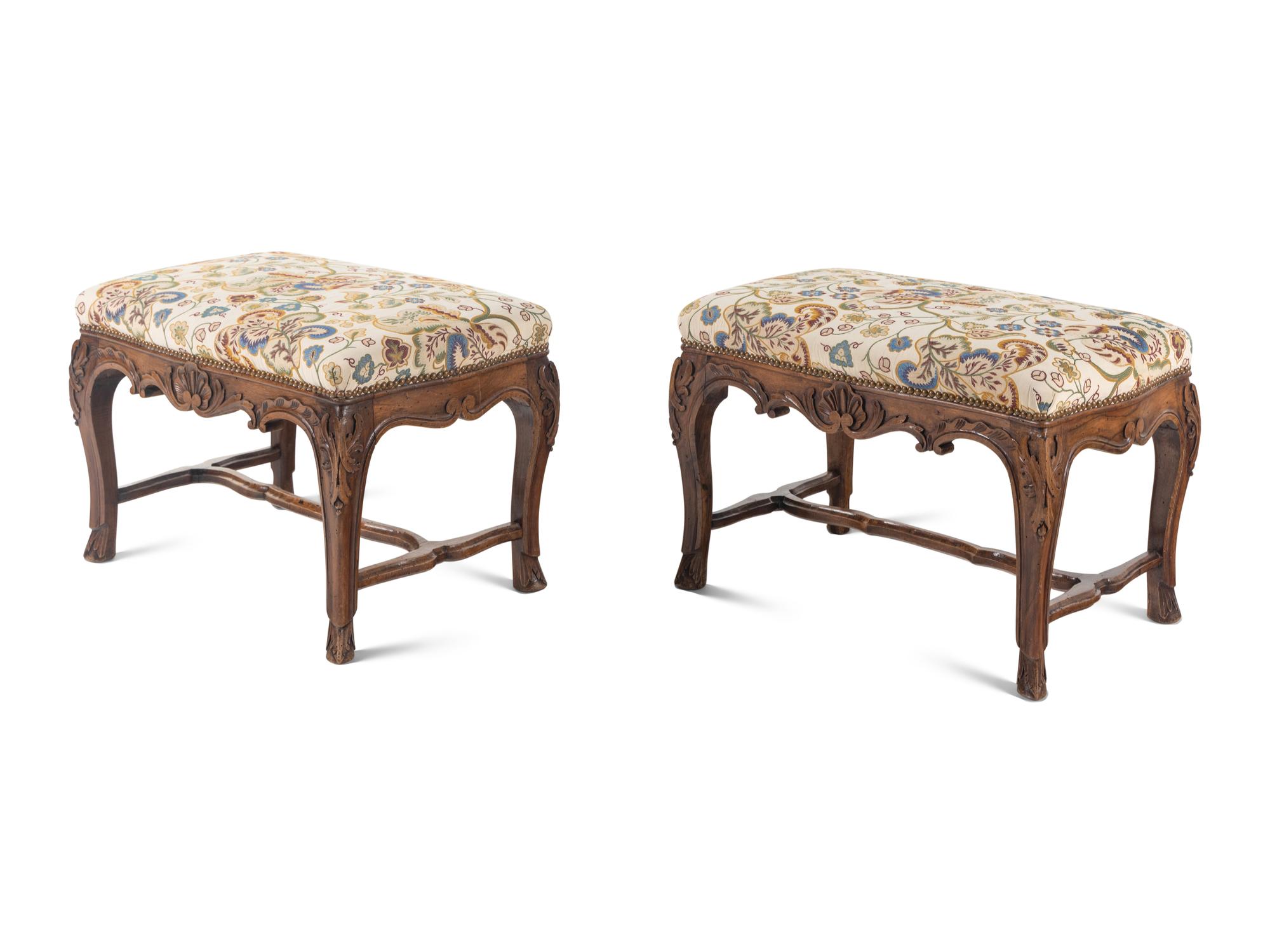 A Pair of Louis XV Style Carved Benches