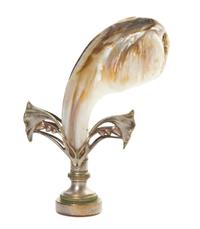 A Mother-of-Pearl and Silvered Metal Seal, Height 3 1/4 inches.