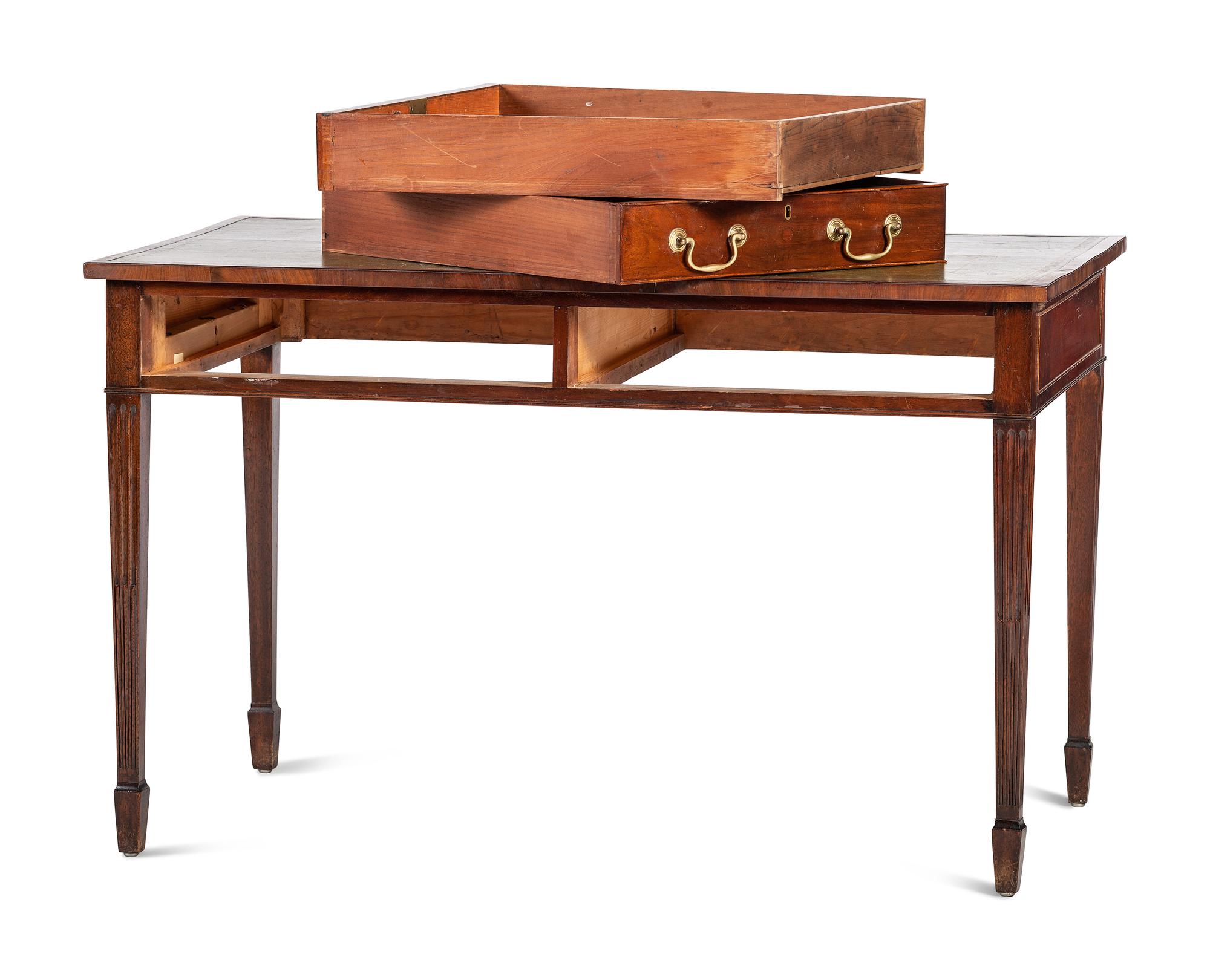 An English Mahogany Leather Inset Writing Table