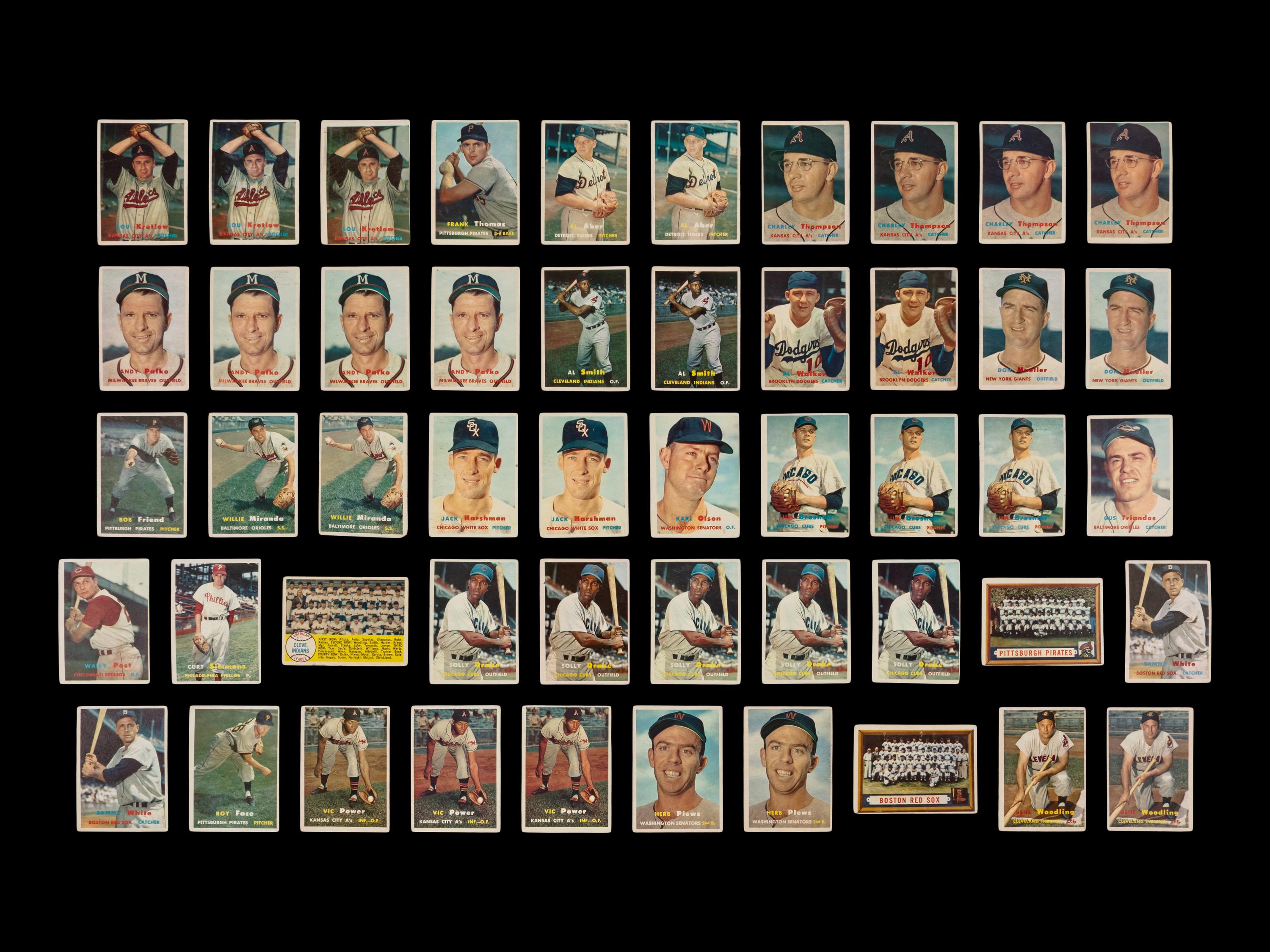 A Collection of 1957 Topps Baseball Cards Including Hall of Famers and Rookies (241)