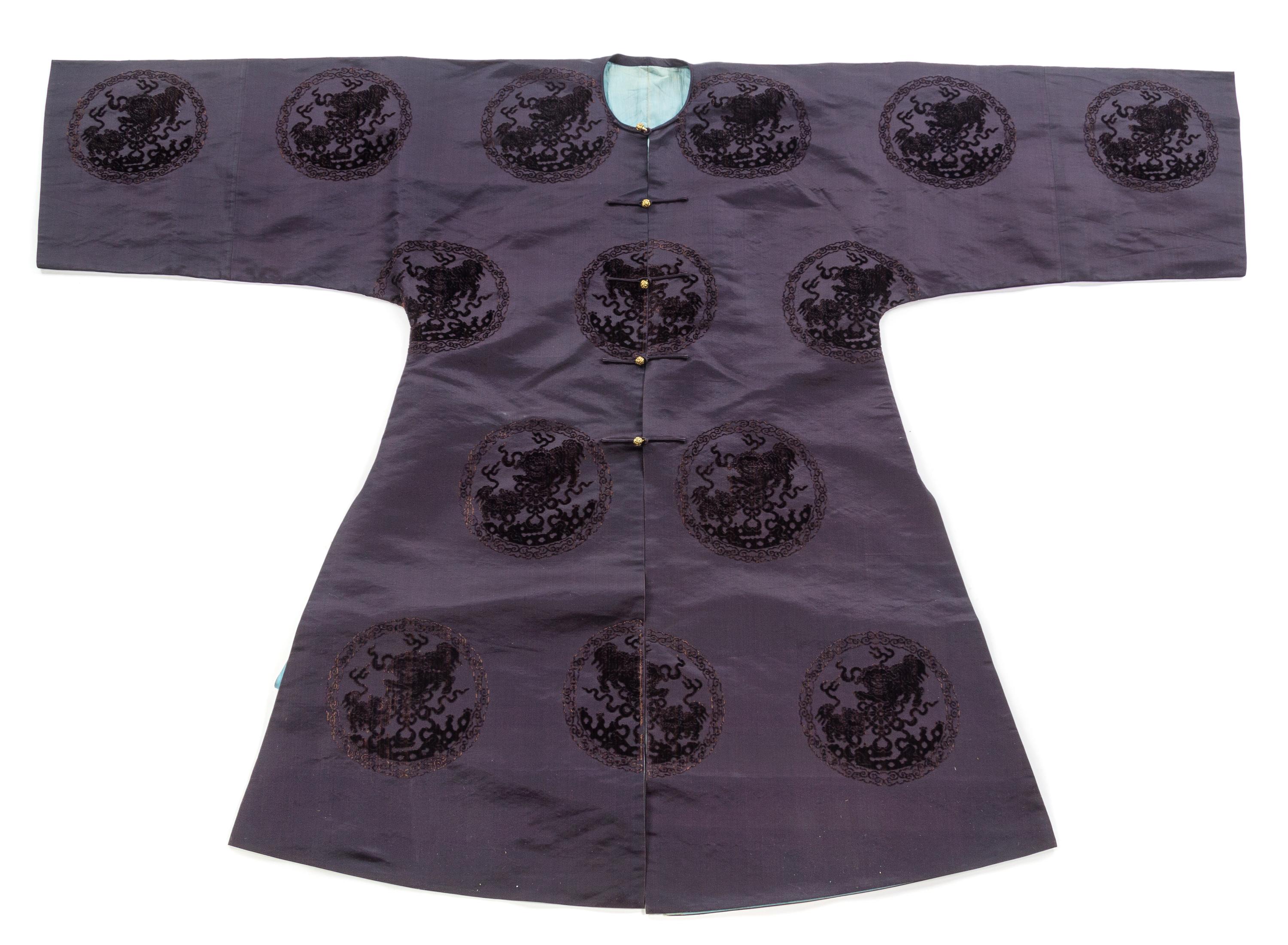 A Chinese Midnight Blue Silk Cut Velvet Surcoat 19TH CENTURY Length 46 inches. — 19TH CENTURY