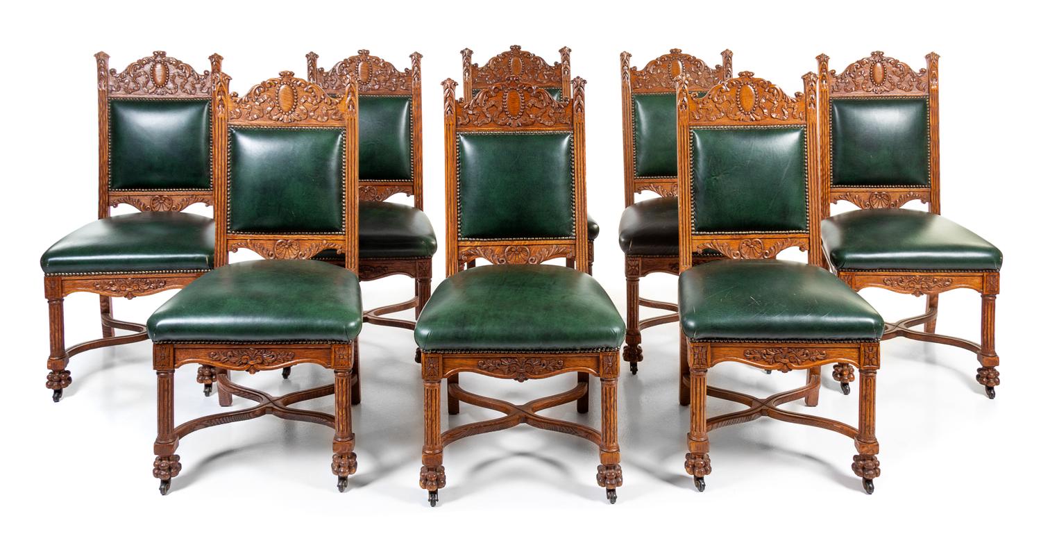 A Set of Eight Victorian Renaissance Revival Oak Dining Chairs Height 42 inches. — LATE 19TH CENTURY