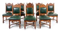 A Set of Eight Victorian Renaissance Revival Oak Dining Chairs Height 42 inches. — LATE 19TH CENTURY