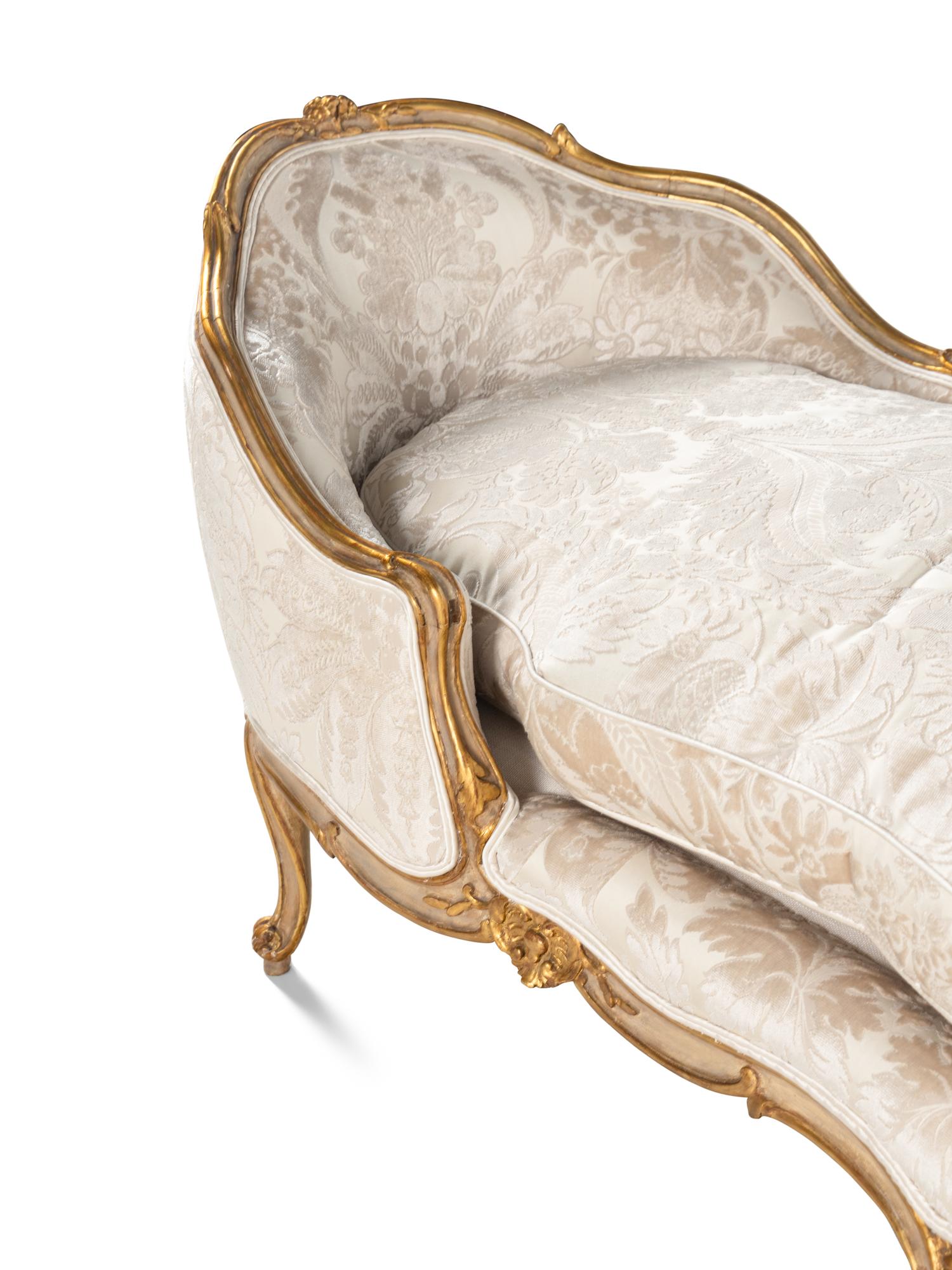 A Louis XV Painted and Parcel Gilt Duchesse en Bateau