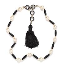 An Yves Saint Laurent Faux Pearl Tassel Necklace, 30.5" long.