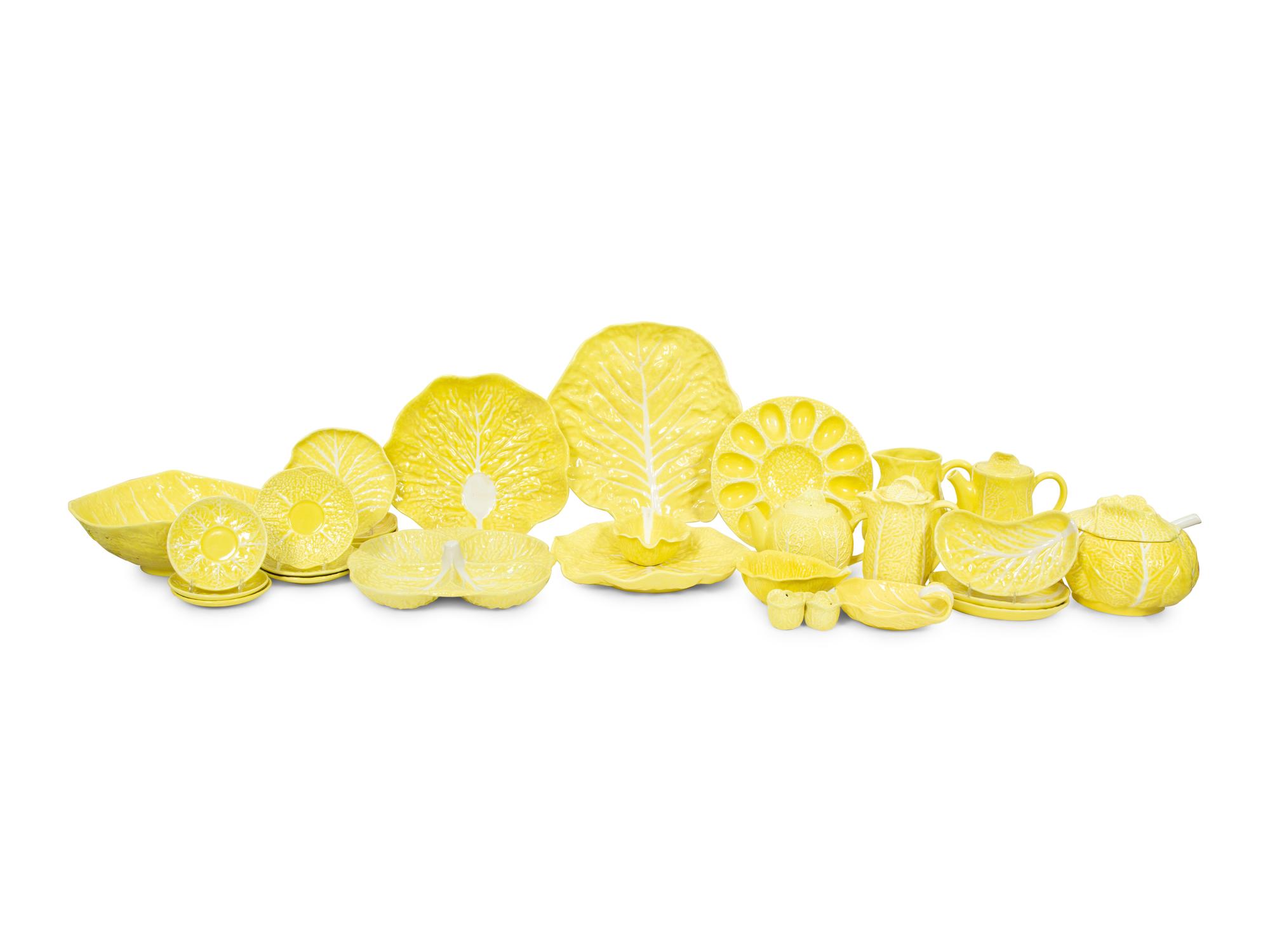 An Extensive Portuguese Yellow Ceramic Lettuce Ware Dinner Service