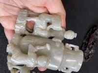 A Chinese jade "Boys, Kylin and Phoenix" vase on carved wood stand 玉雕童子凤鸟花樽及底座