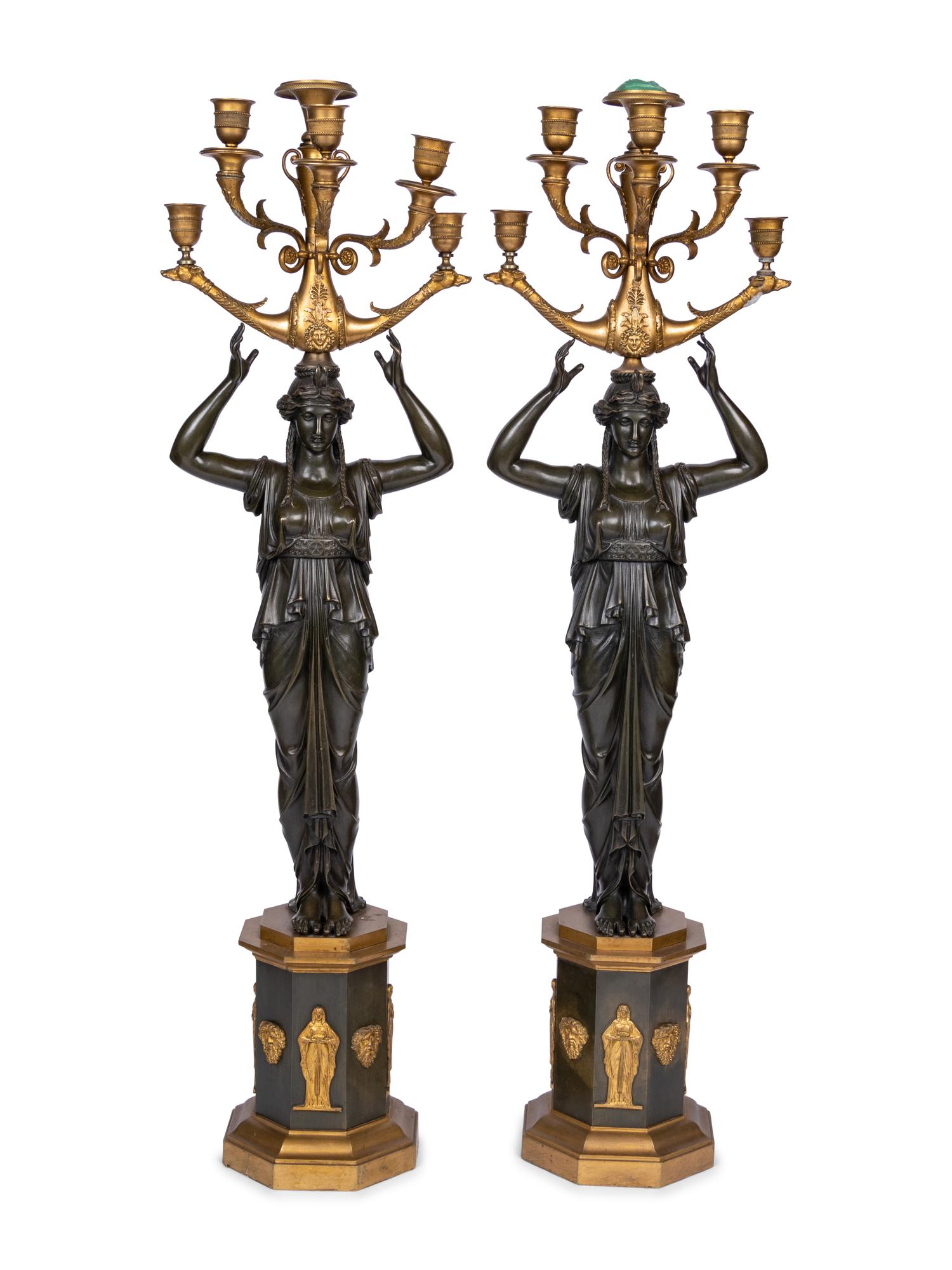 A Pair of Empire Style Gilt and Patinated Bronze Six-Light Figural Candelabra