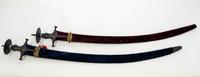 Two Indian Talwar Style Sabers Length of longer 38 1/2 inches. — 20TH CENTURY