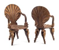 A Pair of Painted and Parcel Gilt “Grotto” Armchairs