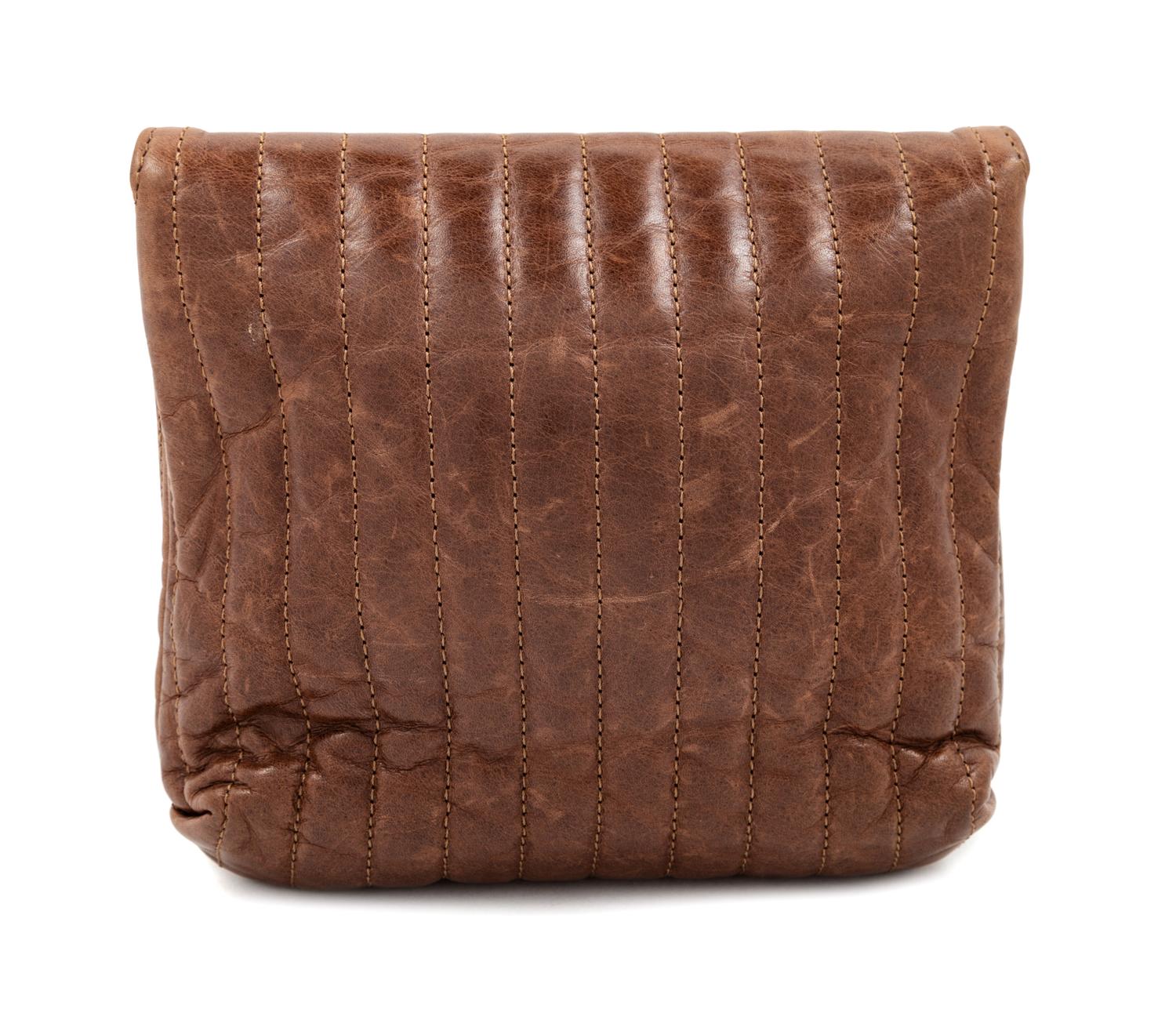 A Lanvin Chocolate Brown Leather Mini Pop Happy Crossbody Bag, 6.75" H x 7" W x 2" D; Strap Drop: up to 22.5".