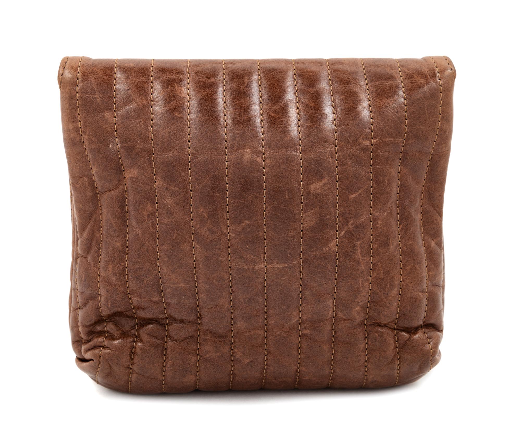 A Lanvin Chocolate Brown Leather Mini Pop Happy Crossbody Bag, 6.75" H x 7" W x 2" D; Strap Drop: up to 22.5".