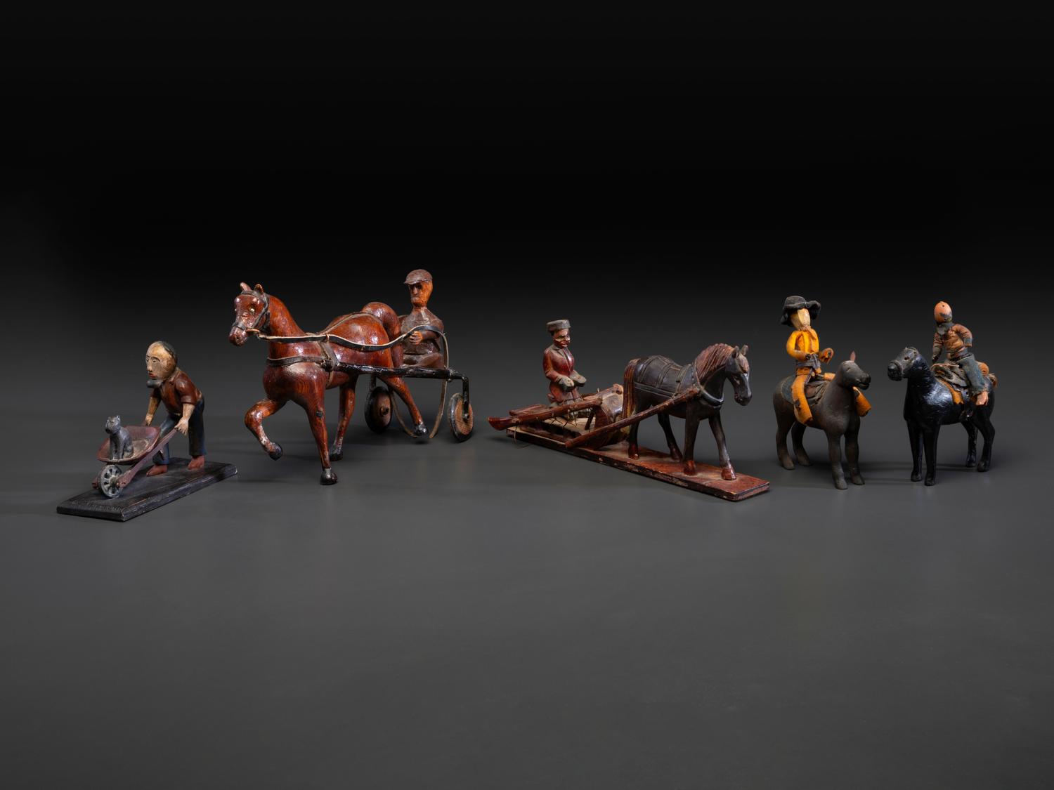 Five Canadian Folk Art Carved and Painted Figures of Men with Animals