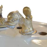 A Porcelain Pedestal Sink with Aquatic Hardware 37.5" W x 27.5" D x 32" H — United States, 20th Century
