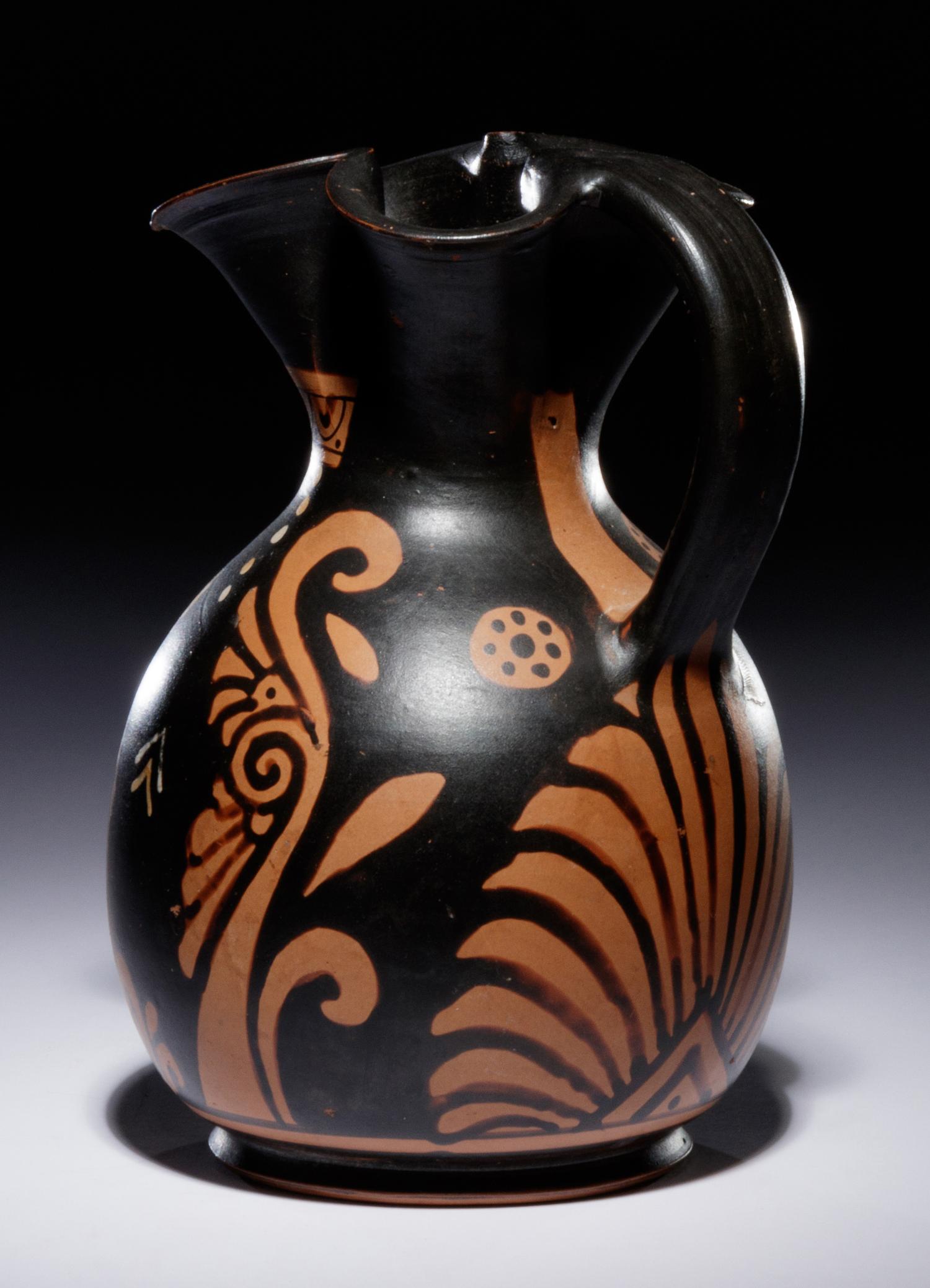 A Paestan Red-Figured Trefoil Oinochoe with a Standing Male Figure