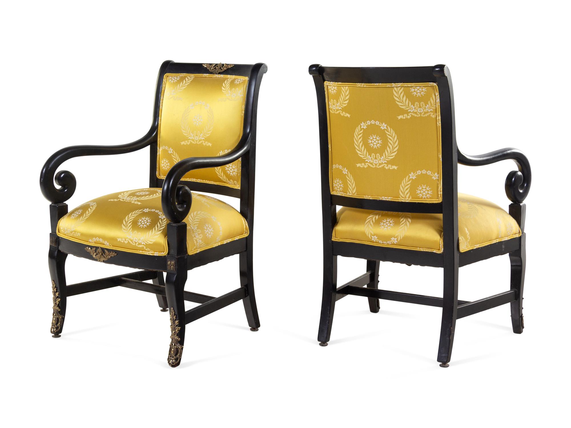 A Pair of Directoire Style Scalamandré Upholstered Ebonized Fauteuils