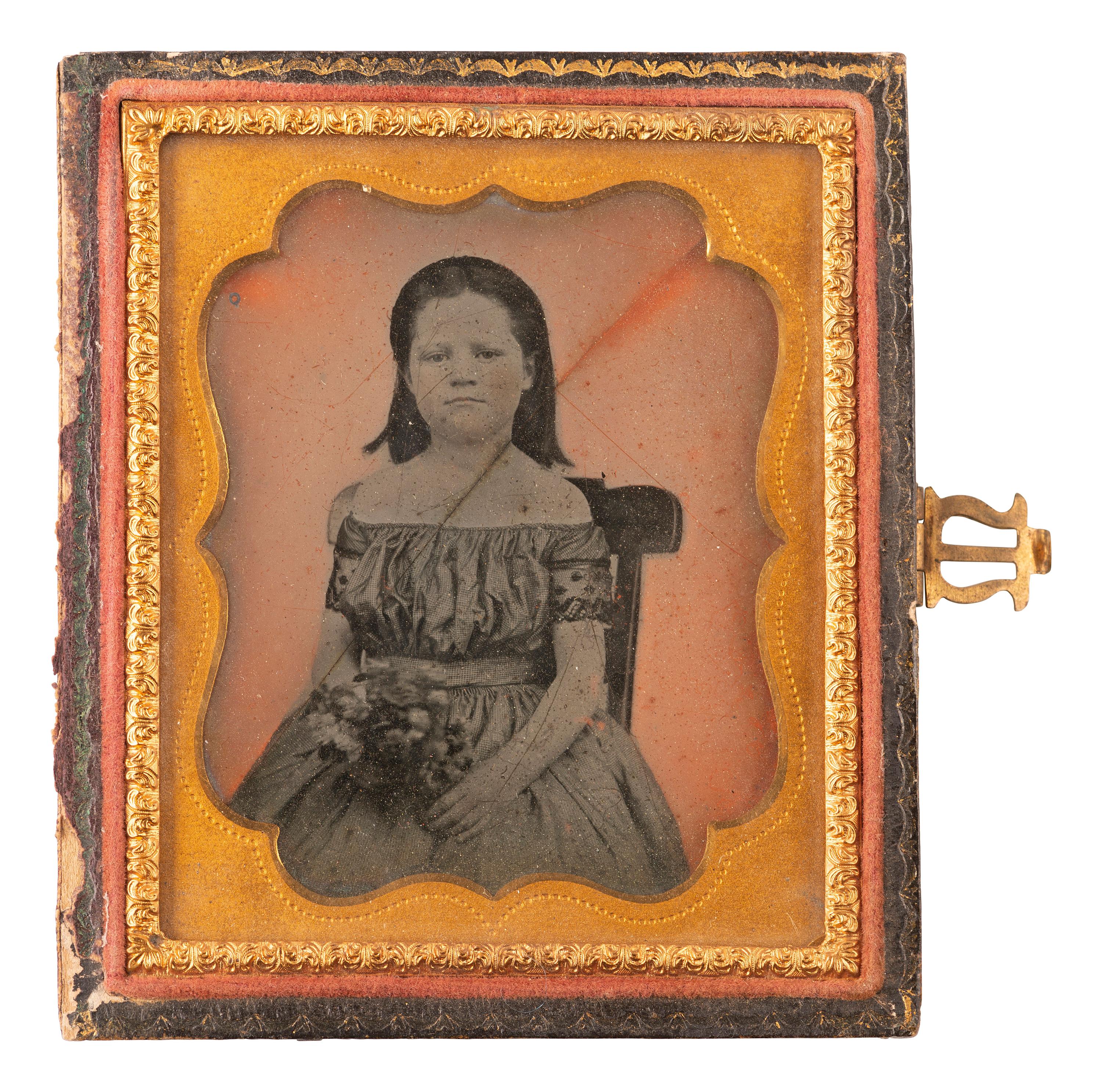 [LINCOLNIANA]. Sixth plate ambrotype of subject identified as Lizzie Gilmer, the daughter of Daniel H. Gilmer, who purportedly demanded a toll from Lincoln.