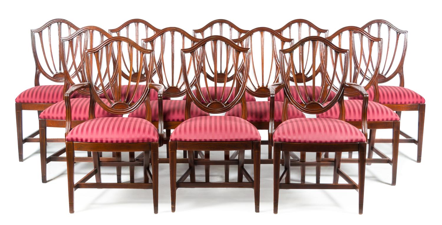 A Set of Twelve Hepplewhite Style Mahogany Dining Chairs Height 38 inches. — 20TH CENTURY