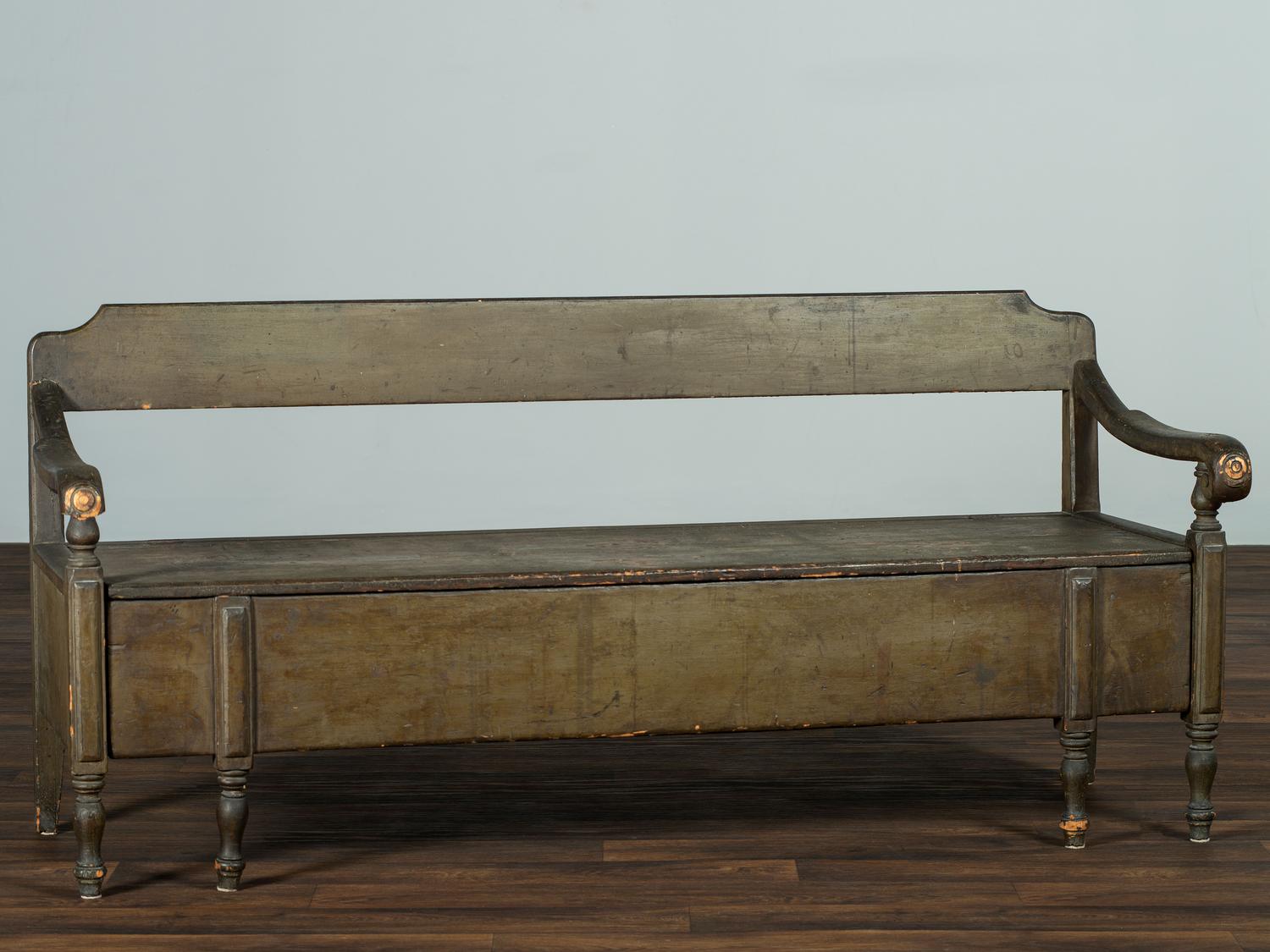 A Swedish-American Green Painted Pine Country Tavern Bench and Trundle Bed