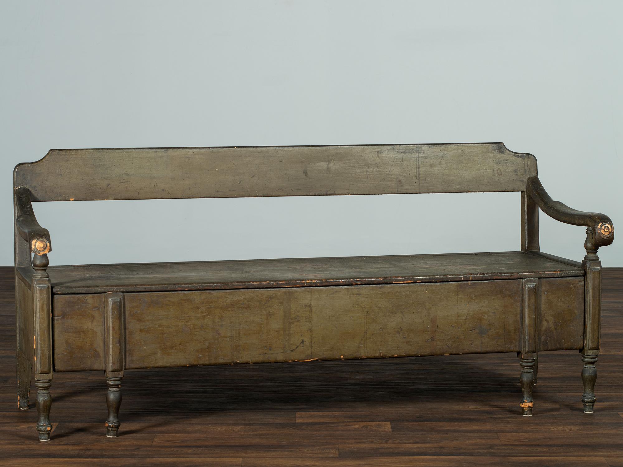 A Swedish-American Green Painted Pine Country Tavern Bench and Trundle Bed