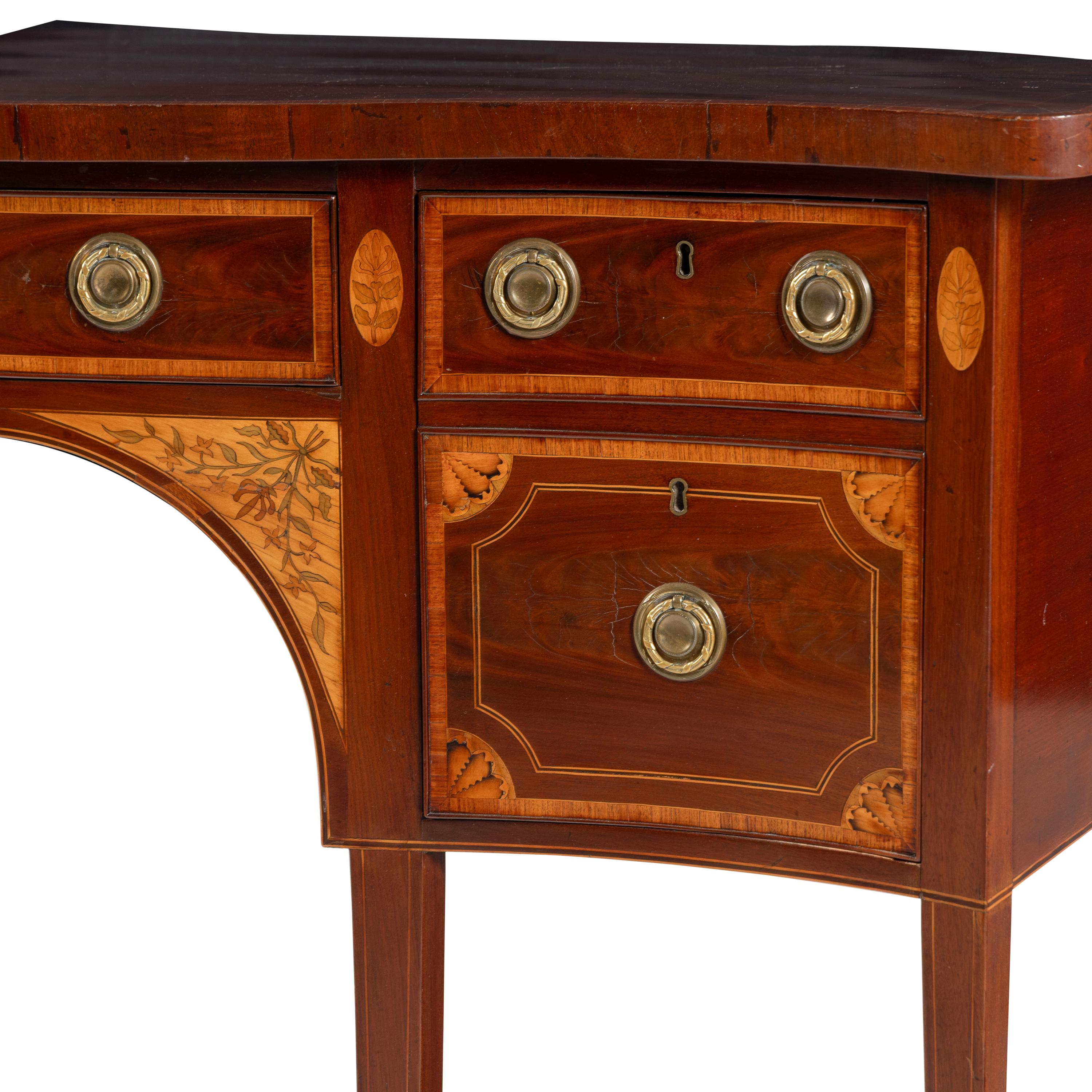 A Late George III Mahogany, Satinwood and Marquetry Serpentine Sideboard