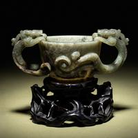 A Grey and Celadon Jade 'Dragon' Handled Cup