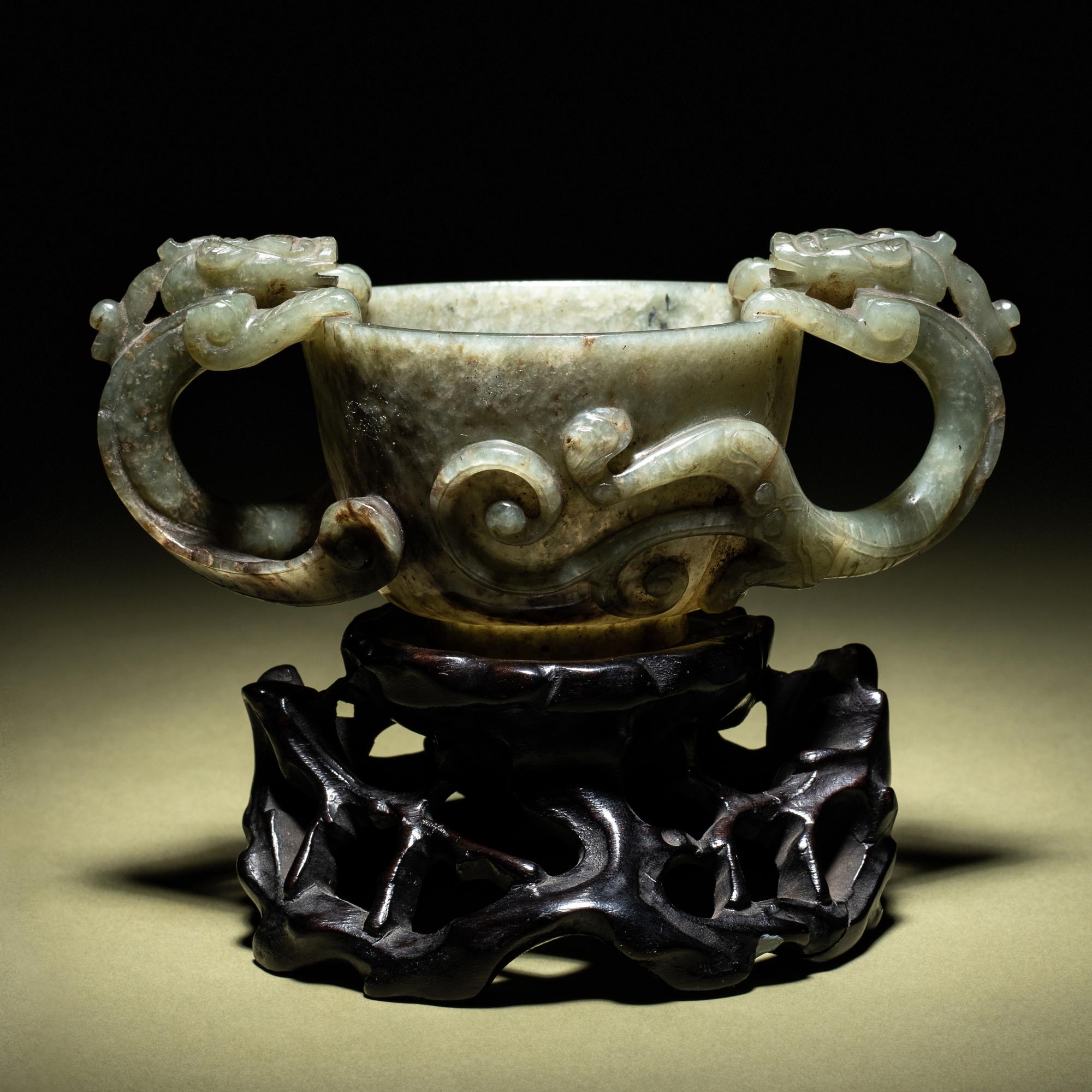 A Grey and Celadon Jade 'Dragon' Handled Cup