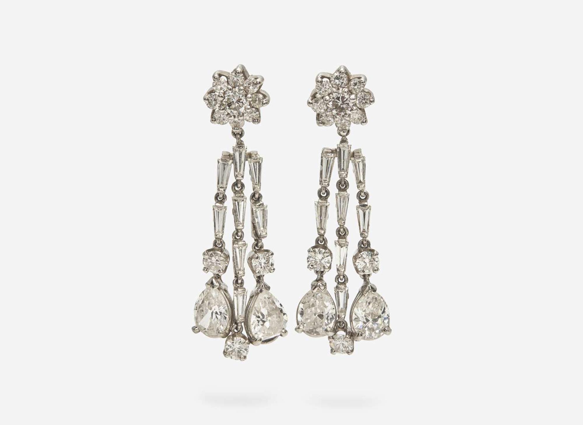 A Pair of 14K White Gold and Diamond Earrings