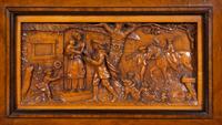 A Continental Carved Walnut and Burlwood Serving Cabinet