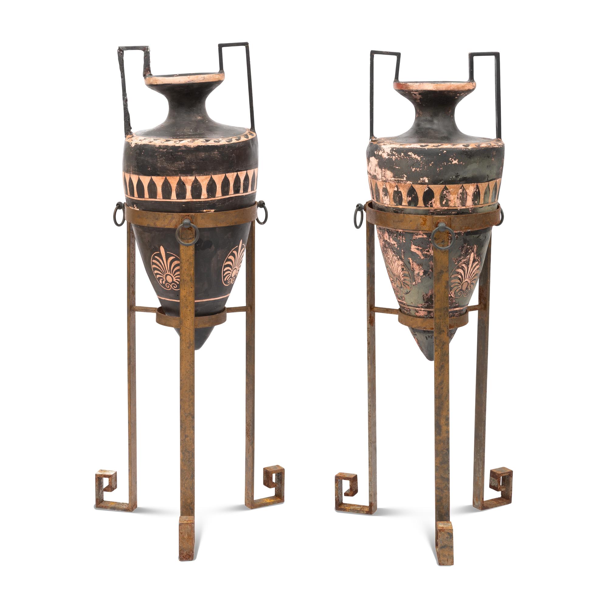 A Pair of Etruscan Style Painted Plaster Amphora on Stands