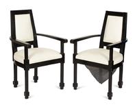 A Pair of Continental Ebonized Armchairs