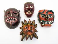 A Group of Eight Mexican Painted Wood Masks Height of first 12 inches.