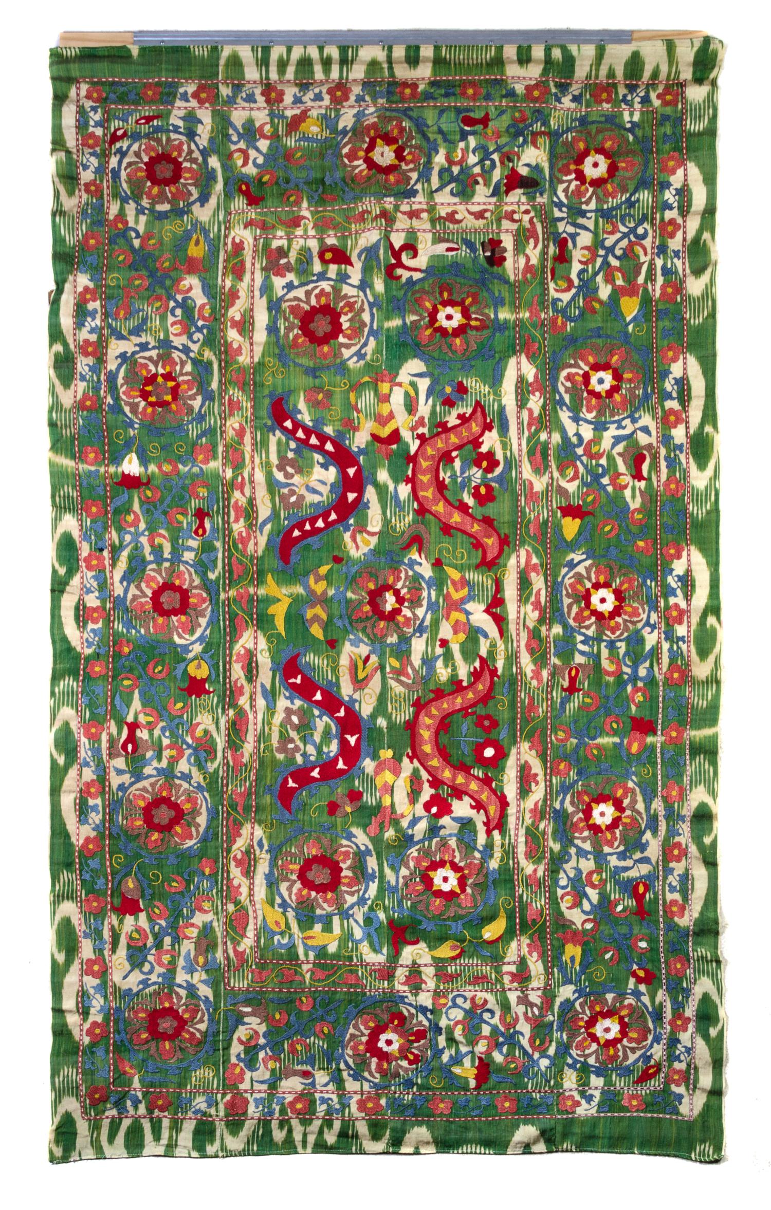 A Suzani Embroidered Panel 7 feet 1 inch x 4 feet 1 inch.