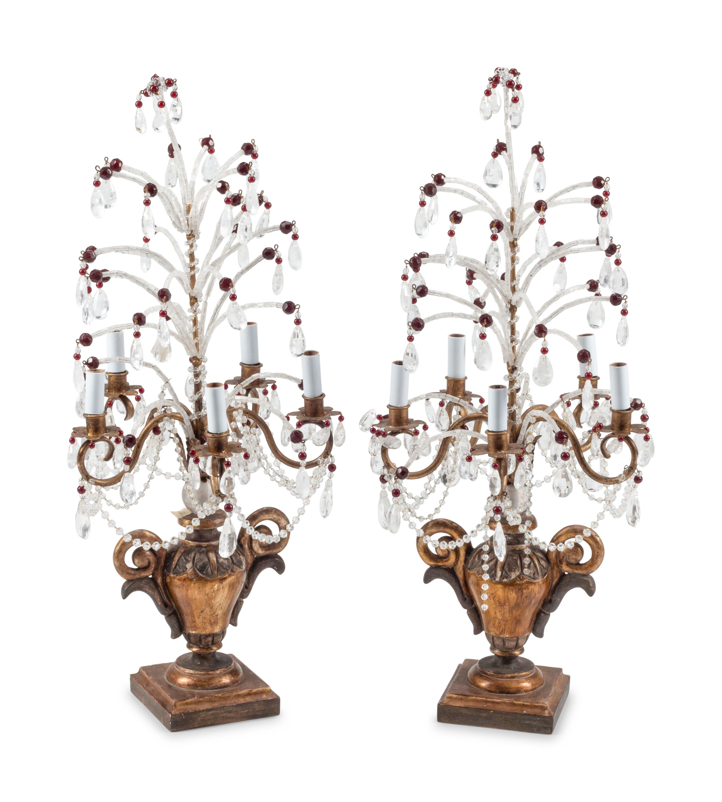 A Pair of Italian Carved and Rock Crystal Mounted Five-Light Candelabra