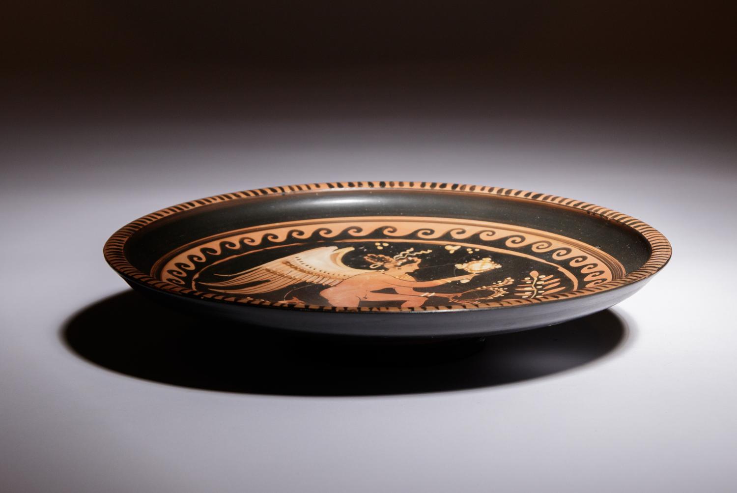 An Apulian Red-Figured Plate with Eros