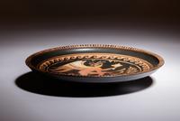 An Apulian Red-Figured Plate with Eros
