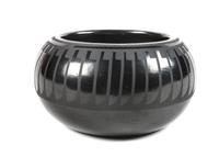 Blue Corn, Crucita Calabaza (San Ildefonso b. 1921-1999) Blackware Bowl Height 2 1/2 x diameter 4 1/2 inches