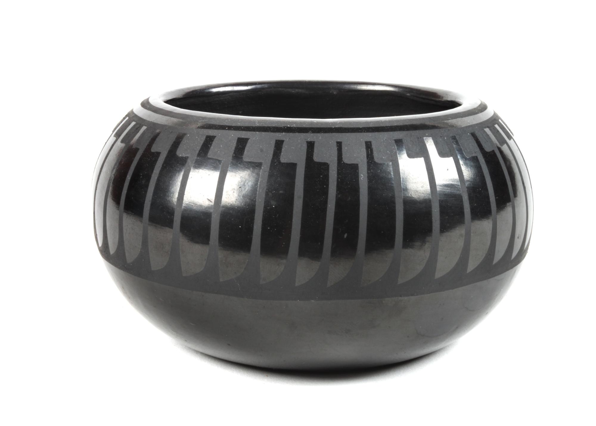 Blue Corn, Crucita Calabaza (San Ildefonso b. 1921-1999) Blackware Bowl Height 2 1/2 x diameter 4 1/2 inches