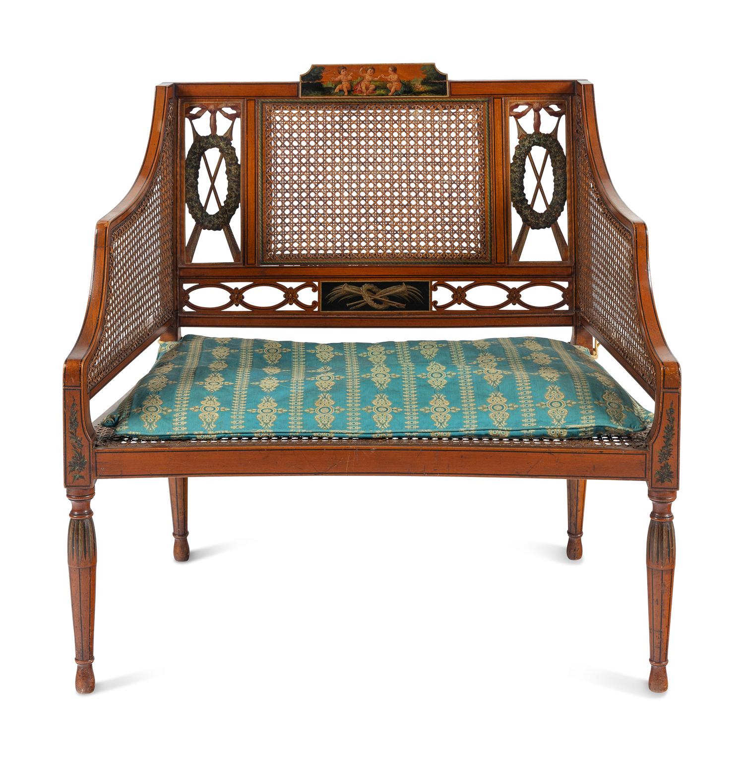 An Edwardian Painted and Caned Armchair