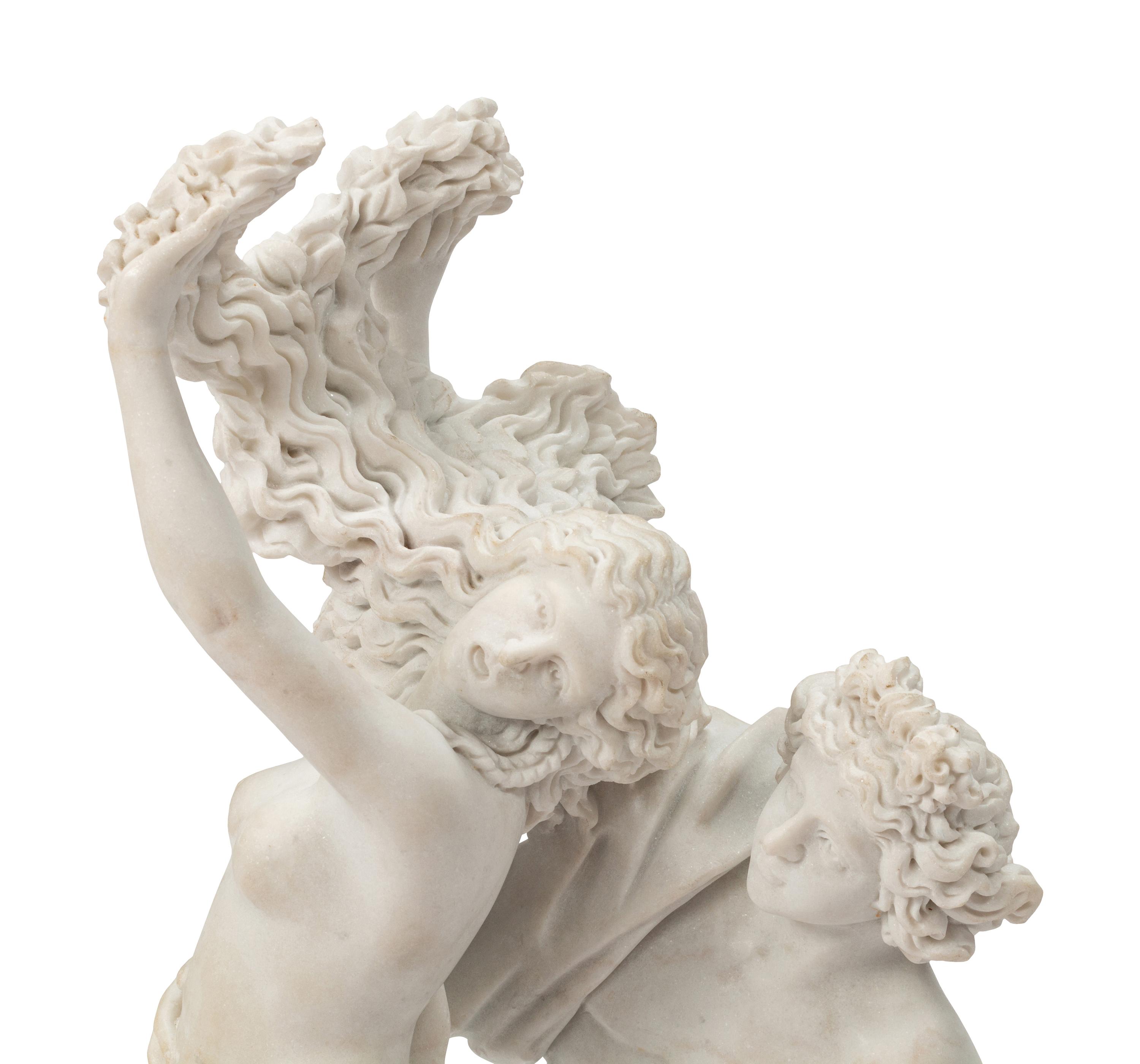 A Continental Marble Figural Group on a Wood Base