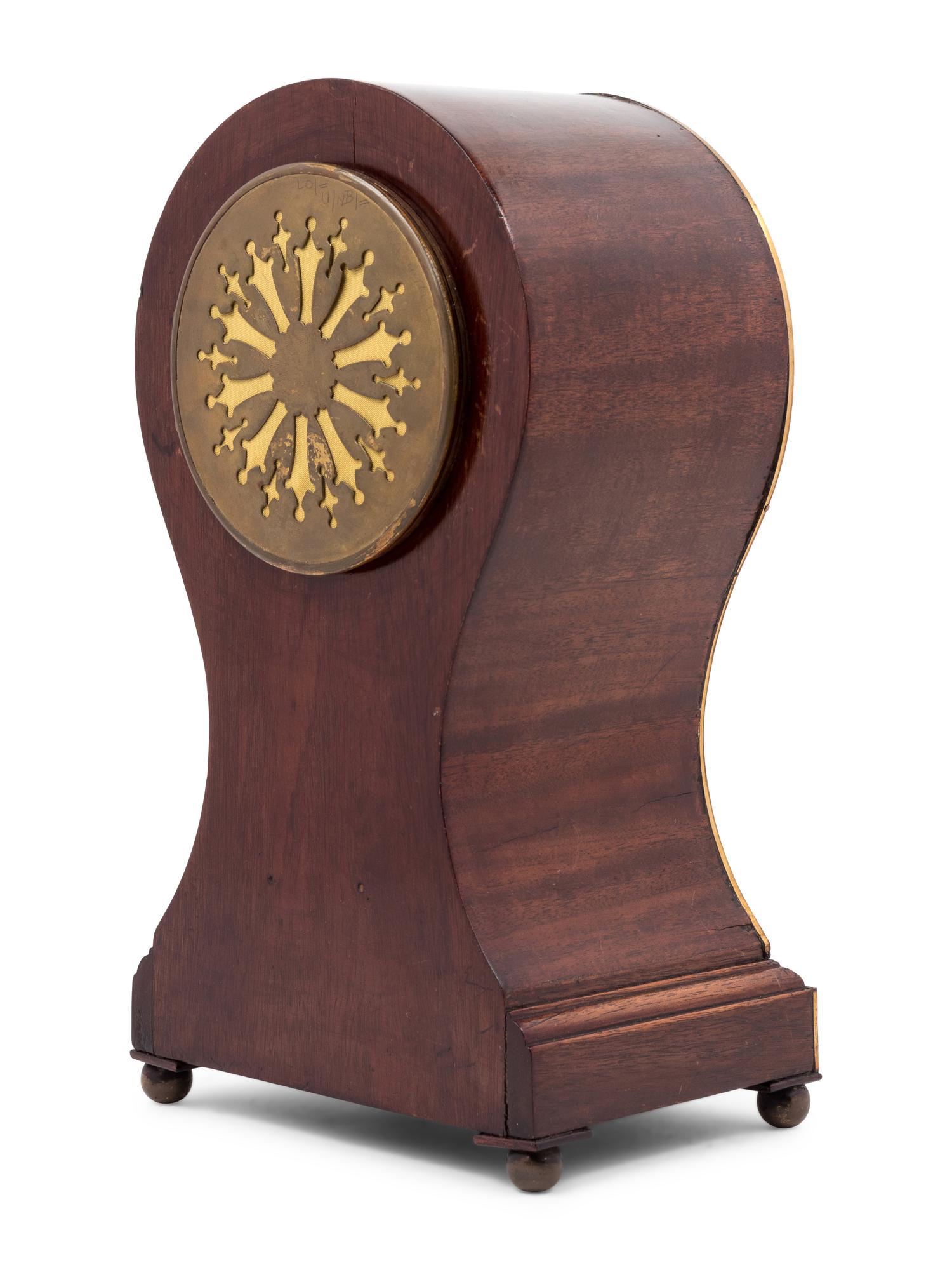 An English Mahogany Balloon Clock