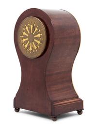 An English Mahogany Balloon Clock