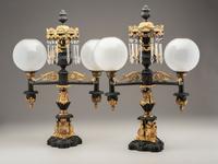 A Pair of Classical Gilt and Patinated Bronze Two-Light Argand Lamps with Shades