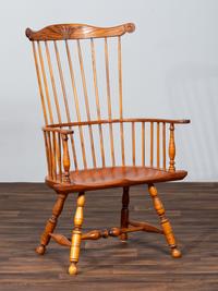 A D.R. Dimes Benchmark Turned and Volute Carved Tiger Maple and Pine Comb-Back Windsor Armchair