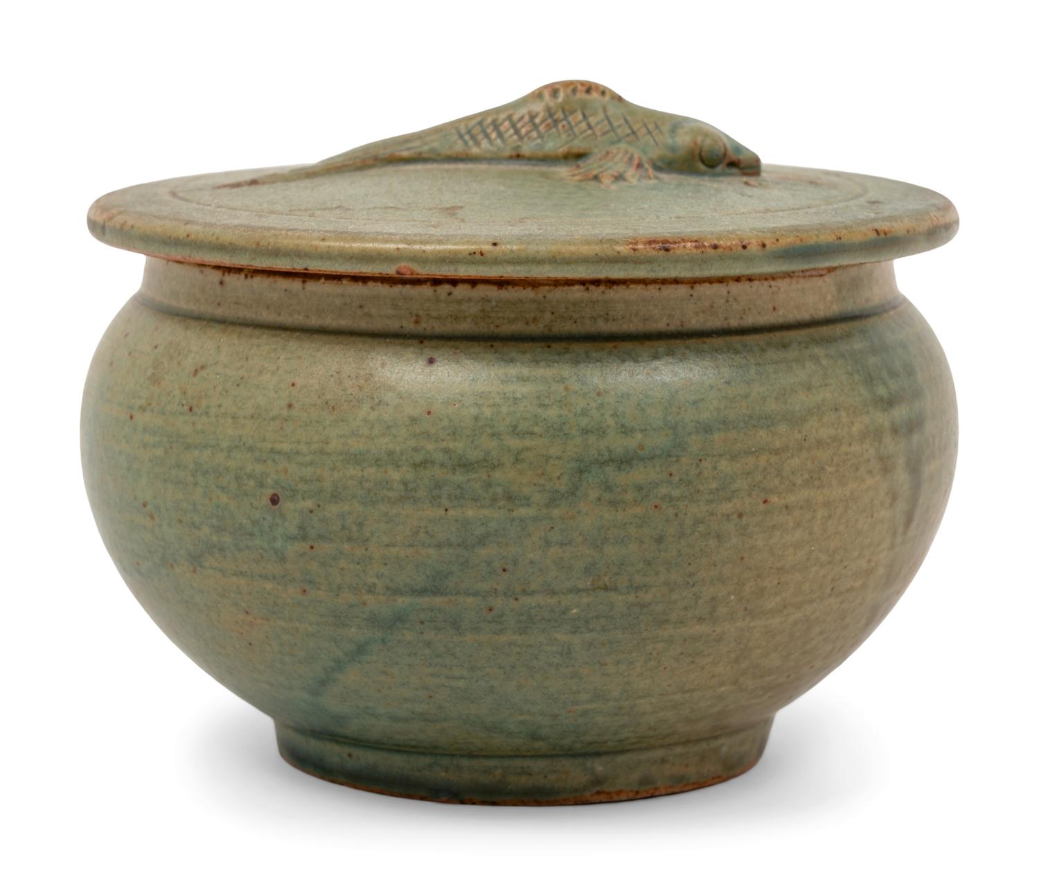 A Celadon Glazed Pottery Covered Jar